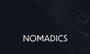 Logo for NOMADICS, a leader in geospatial intelligence, digital information and data analytics, and specialized system engineering.